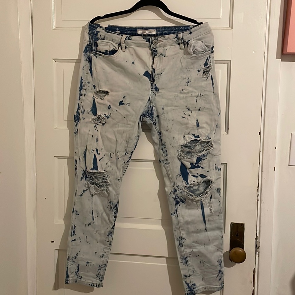blue and white ripped jeans